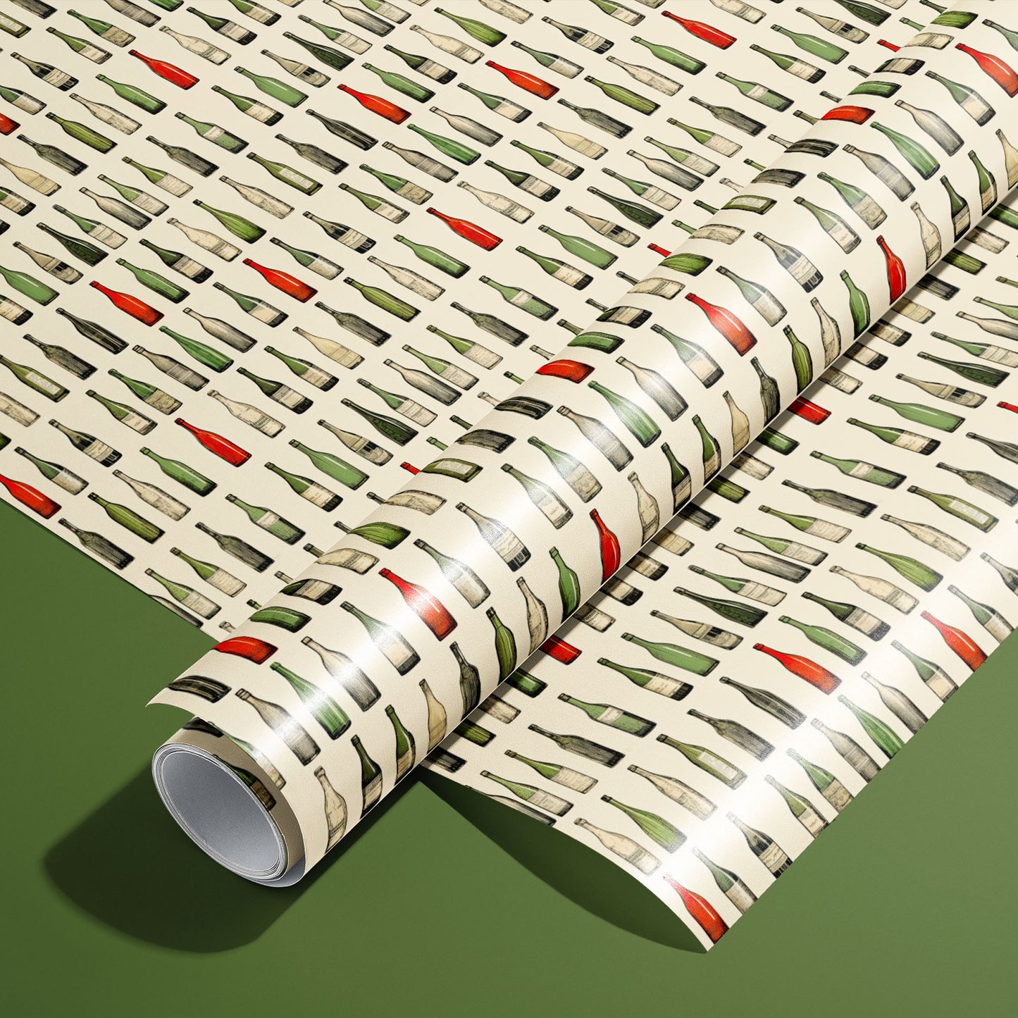 A roll on an unrolled sheet of Classic Vino wrapping paper with watercolor wine bottles in green, red, and clear on cream, set on an olive green background.
