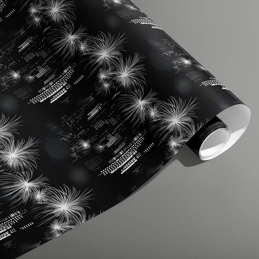 A partially unfurled roll of Skyline Magic featuring monochrome skyscraper lights and bursting fireworks on a black ground, set on a medium gray background.