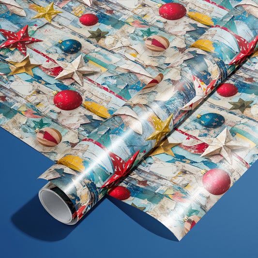 A roll on an unrolled sheet of Weathered Cheer wrapping paper with distressed wood textures, paper stars, and vintage ornaments in teal, red, and gold on a deep blue background.