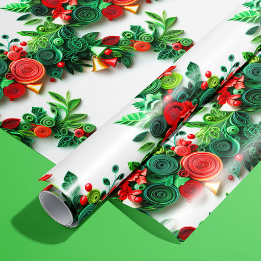 A roll of Festive Quills wrapping paper on an unrolled sheet, featuring quilled paper spirals, holly leaves, poinsettias, berries, and golden bells on white, set on a bright green surface.