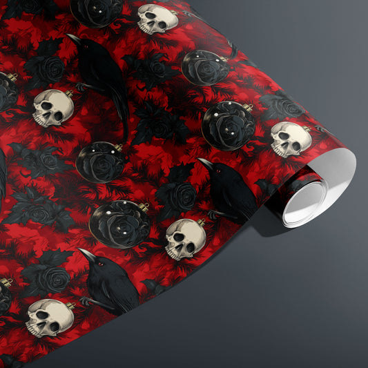 A partially unfurled roll of Merry Macabre displays ravens, skulls, black roses, and gothic ornaments scattered over crimson foliage against a charcoal gray background.