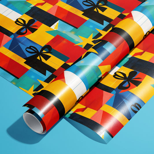 A roll of Joyful Jumble rests on a matching unrolled sheet, featuring stacked gift boxes, ribbon bows, and star bursts in bold geometric colors on a sky-blue surface.