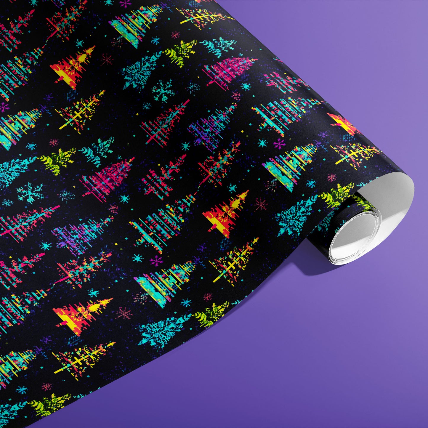 A partially unfurled roll of Glitchmas Trees gift wrap displays stacked, glitchy triangular trees with digital noise on a dark ground against an electric purple background.