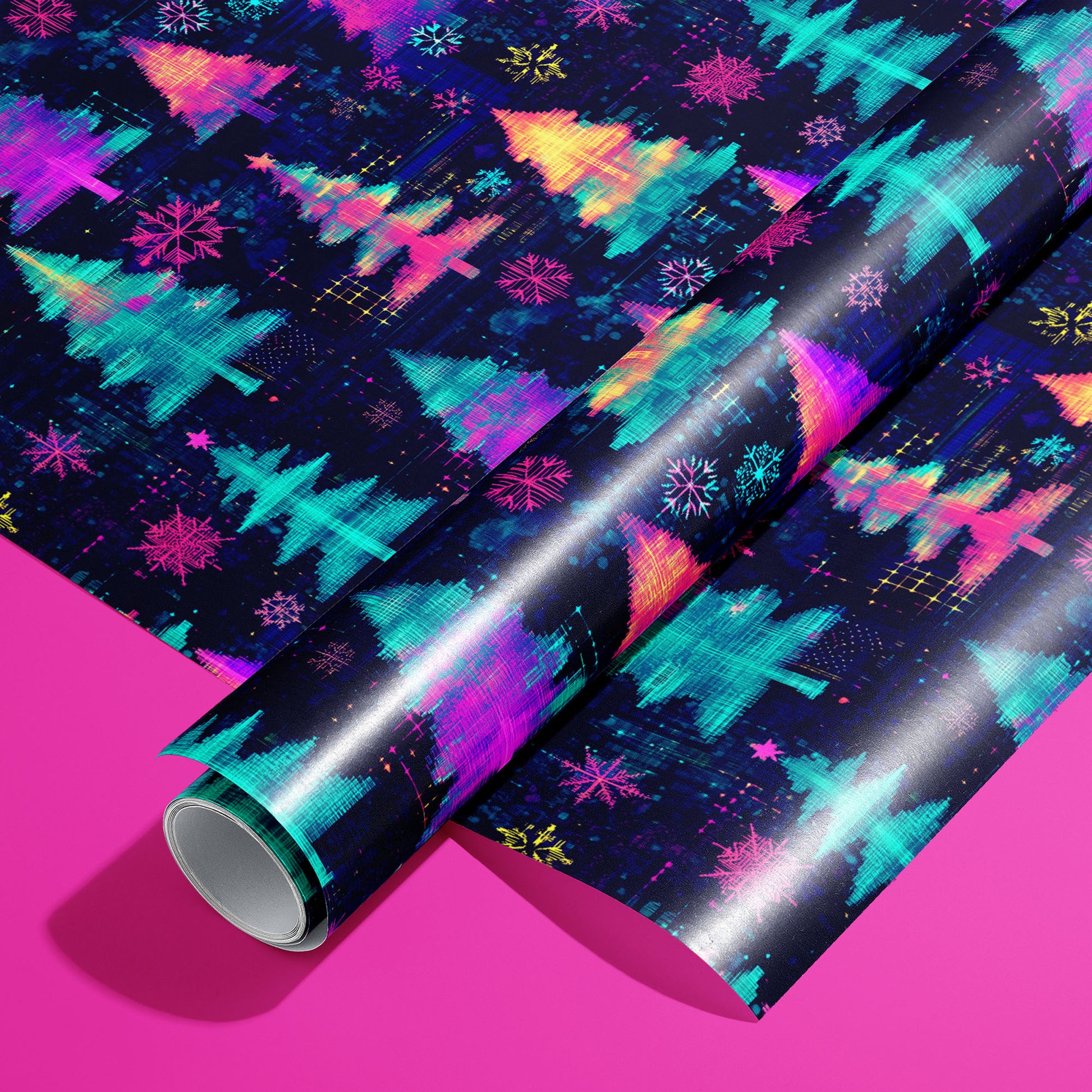 A roll of Electric Evergreen wrapping paper resting on a matching unrolled sheet, featuring neon glitch-style Christmas trees and snowflakes on deep navy, set on a hot pink background.
