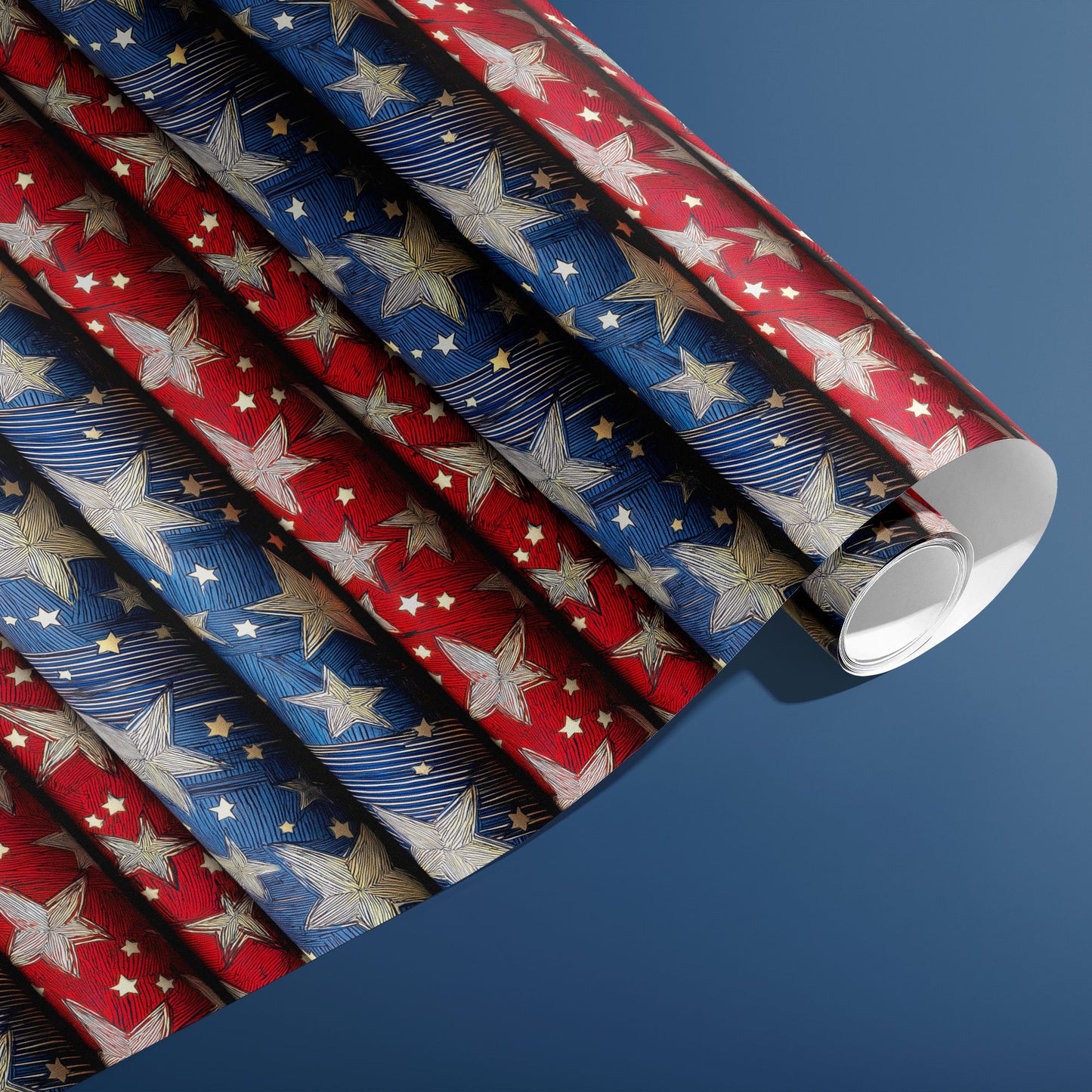 A partially unfurled roll of Starwoven Glory gift wrap shows embroidered-style stars and celestial lattice on a midnight blue ground against a deep navy background.