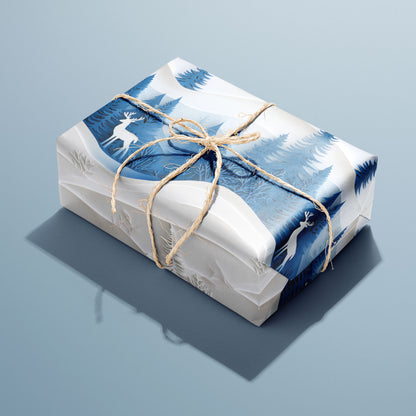 A single gift wrapped in Alpine Serenity and tied with natural twine, revealing alpine mountains, evergreens, and starlight on a deep blue ground, set on a cool slate-blue surface.
