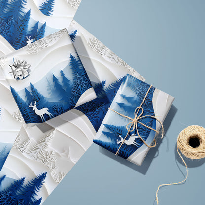 Two gifts wrapped in Alpine Serenity—one with a silver bow and one tied with twine—rest on two unused sheets beside a twine spool on a cool slate-blue surface, with snowy peaks and fir trees.