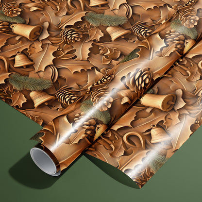 A roll of Woodland Wonders wrapping paper on an unrolled sheet, featuring carved-wood style pinecones, holly leaves, fir sprigs, and bells in warm browns on a deep green background.