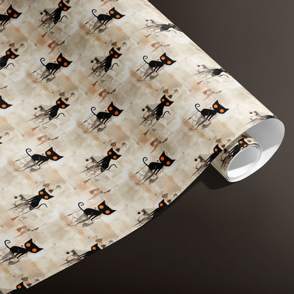 A partially unfurled roll of Contemporary Black Cats wrapping paper reveals stylized black cats with orange eyes atop a beige watercolor wash on a deep espresso background.