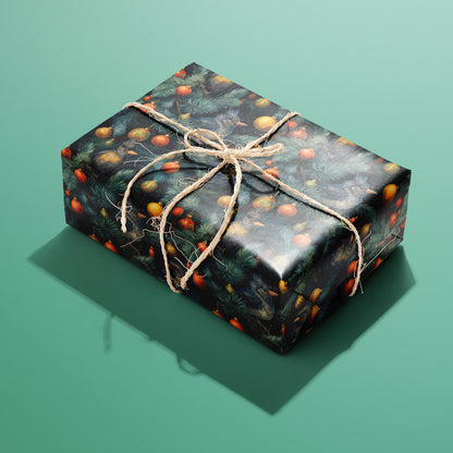 A single rectangular gift wrapped in Birds in Boughs and tied with natural twine shows birds nestled in evergreen boughs with red and gold ornaments, styled on a pale teal surface.
