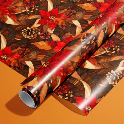 A roll of Cedar & Scarlet wrapping paper resting on a matching unrolled sheet, featuring scarlet poinsettias, cedar-like leaves, and pinecones on an orange background.