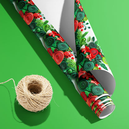 A partially unfurled roll of Festive Quills with its white underside visible beside a spool of natural twine, displaying quilled holly, berries, and bells on white over a bright green surface.
