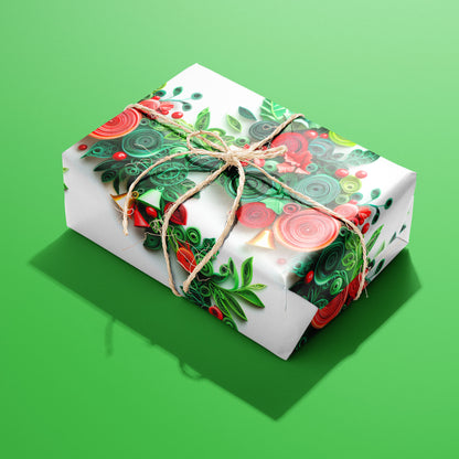 A single gift wrapped in Festive Quills and tied with natural twine, revealing quilled spirals with holly, poinsettias, and bells on white, set on a bright green surface.