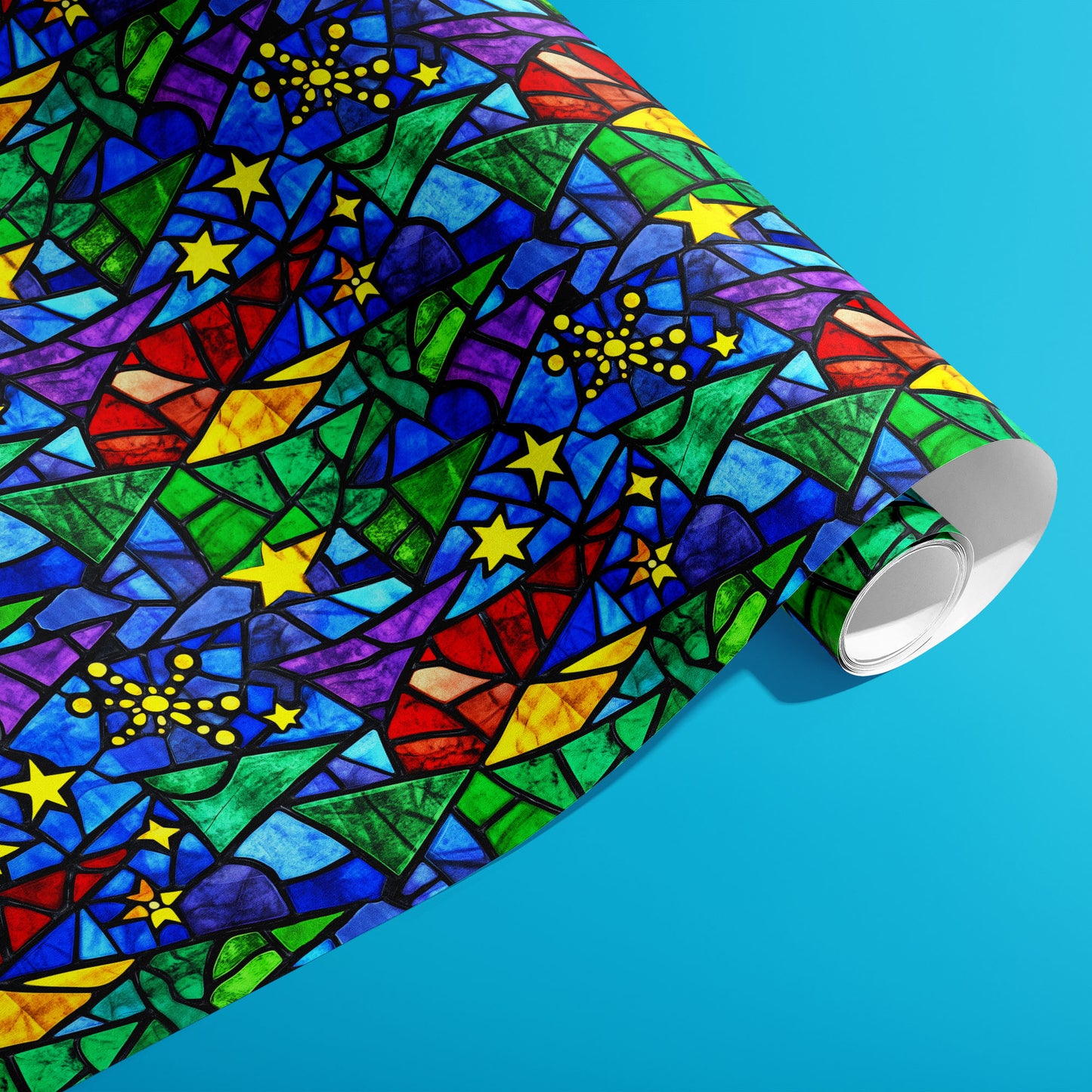 A partially unfurled roll of Starlit Holiday gift wrap reveals stained-glass stars and festive tree shapes in vivid jewel tones against a bright cyan background.