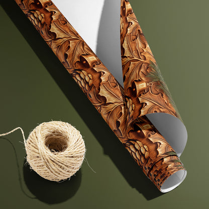 A partially unfurled roll of Pinewood Bells, white underside visible beside a spool of natural twine, shows carved-wood bells and pinecones on an olive green surface.