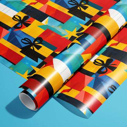 A roll of Joyful Jumble rests on a matching unrolled sheet, featuring stacked gift boxes, ribbon bows, and star bursts in bold geometric colors on a sky-blue surface.