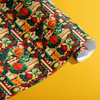 A partially unfurled roll of Merry Midcentury gift wrap showing colorful midcentury ornaments, holly leaves and geometric stripes against a vibrant yellow backdrop.