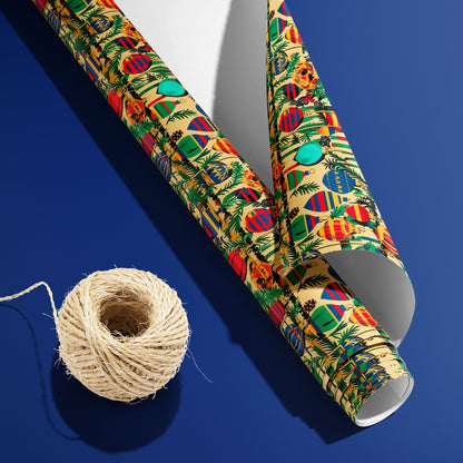 A curled roll of Retro Ornament Celebration wrapping paper revealing its white underside beside a spool of natural twine on a deep blue background.