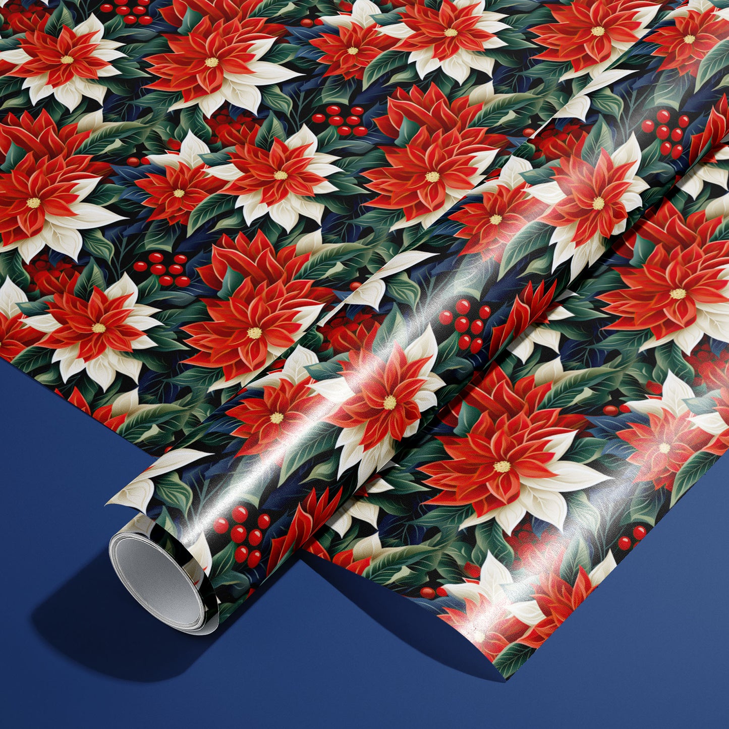 A roll of Classic Poinsettias wrapping paper resting on a matching unrolled sheet, covered in red and white poinsettias and holly berries on a deep blue background.