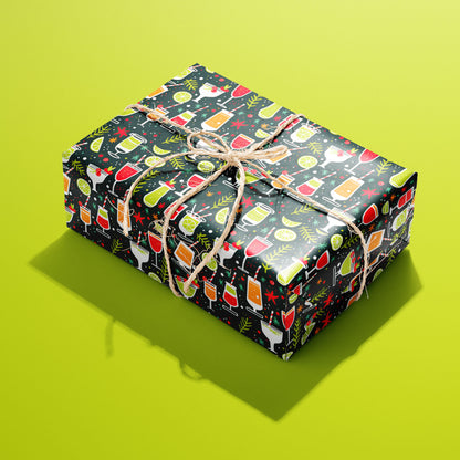 A single box wrapped in Christmas Cocktails paper, covered in playful festive drink motifs and tied with rustic twine on a lime green backdrop.