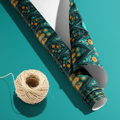 A partially unfurled roll of Wisteria Cathedral paper with the white underside visible sits beside natural twine on a teal backdrop, revealing moonlit arches and floral vines.